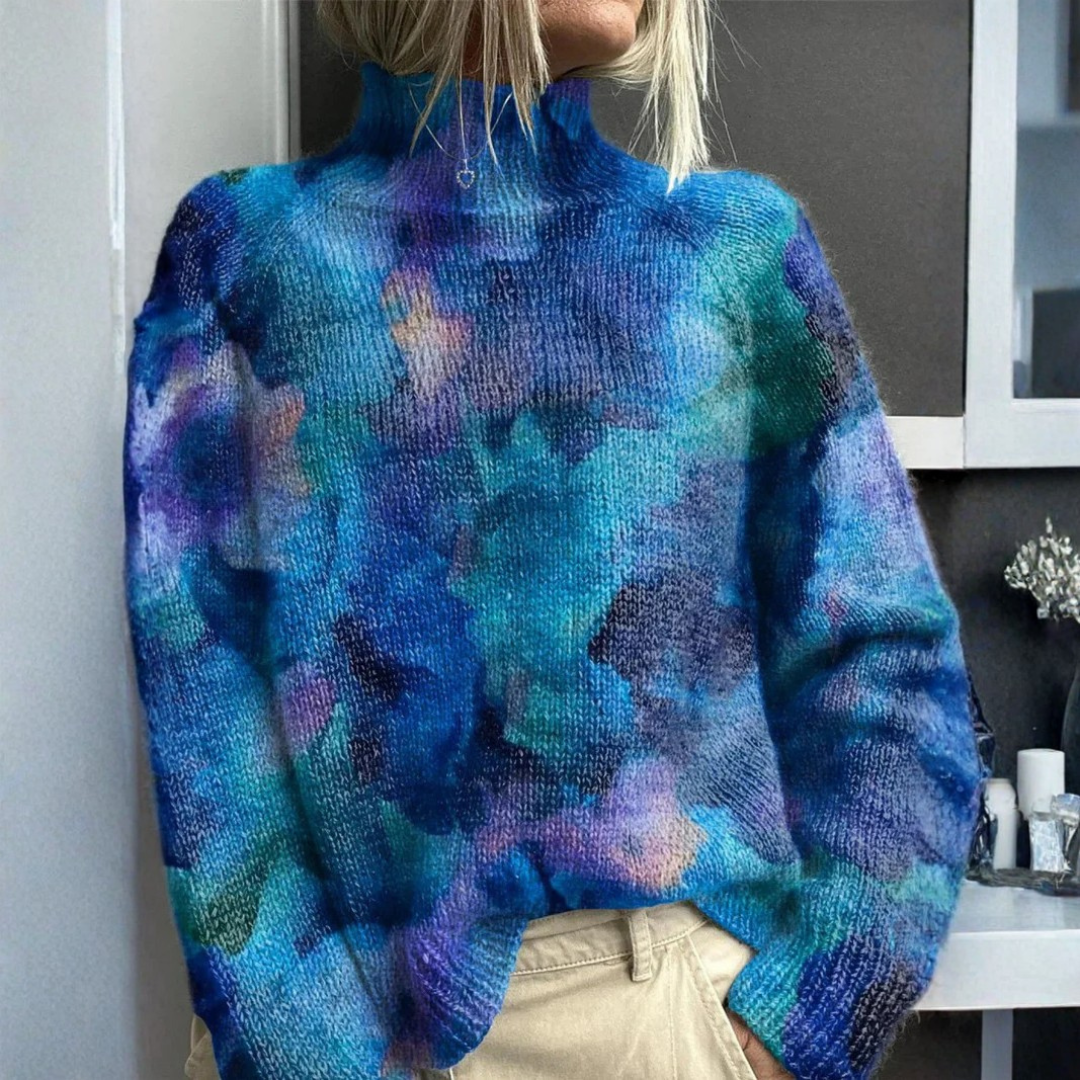 Suéter de cuello alto cálido y elegante de la marca Vibes Madrid, en color neutro, con diseño moderno y textura suave.