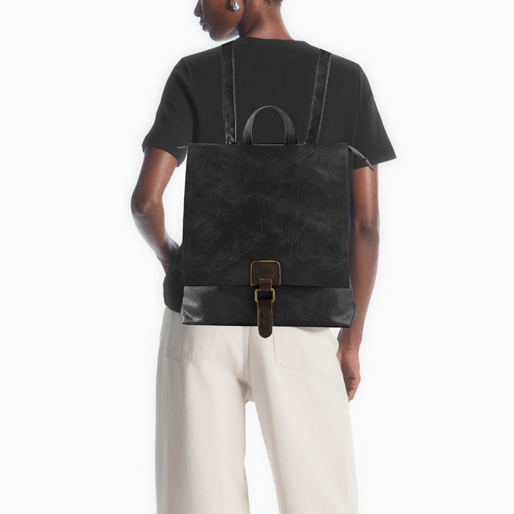 Mochila retro multifuncional Armelinda de Vibes Madrid, con compartimentos y diseño vintage en tela resistente.